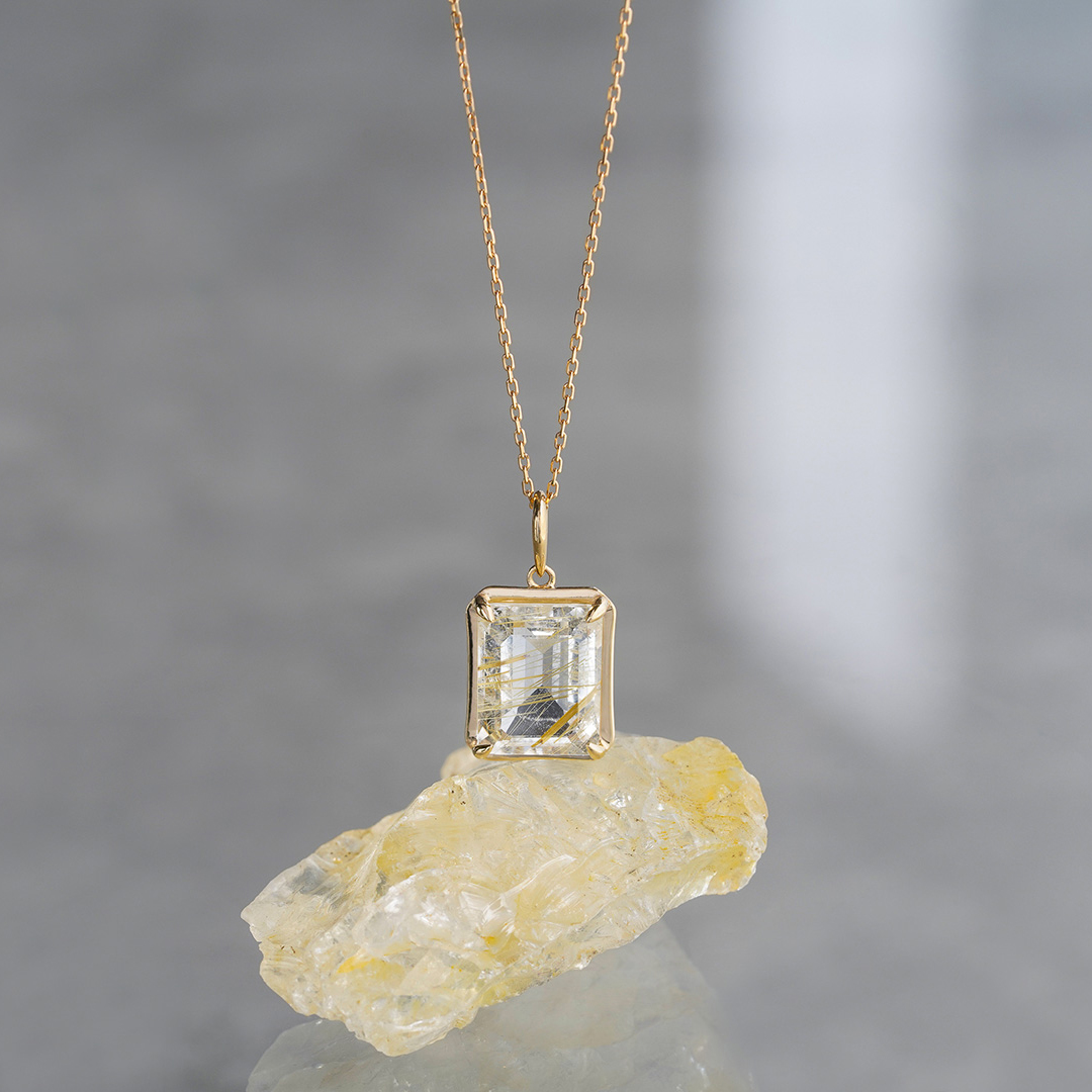 Rutile quartz rectangle charm /ルチルクォーツ. | Hariqua